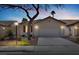 Charming single-story home with a well-manicured front yard, mature tree, and a two car garage at 4443 Verdiccio Ave, Las Vegas, NV 89141