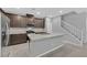 Well-equipped kitchen with granite counters, stainless appliances and a central island at 502 Sonoma Range St, Las Vegas, NV 89138