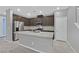 Stylish kitchen featuring an island with granite countertops and stainless steel appliances at 502 Sonoma Range St, Las Vegas, NV 89138