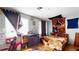 Bedroom featuring window, dresser, and a bed at 5517 Rose Thicket St, Las Vegas, NV 89130
