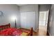 Bright bedroom featuring a closet with paneled doors and a connected view at 5517 Rose Thicket St, Las Vegas, NV 89130
