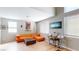 Comfortable seating area with large windows and modern decor at 5517 Rose Thicket St, Las Vegas, NV 89130