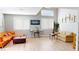 Bright and airy living area with contemporary furniture, high ceilings, and natural light at 5517 Rose Thicket St, Las Vegas, NV 89130