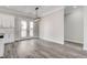 Dining area with French doors and modern lighting, perfect for entertaining and Gathering meals at 5601 Mary Lou St, Pahrump, NV 89061
