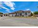 Lovely home exterior with a three-car garage and a gravel front yard at 5601 Mary Lou St, Pahrump, NV 89061