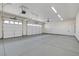 A clean garage features two bays and an automatic door system for easy access and secure parking at 5601 Mary Lou St, Pahrump, NV 89061