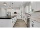 Contemporary kitchen with white cabinets, subway tile backsplash, and stainless steel appliances at 5601 Mary Lou St, Pahrump, NV 89061