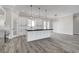 Spacious kitchen with a large island, sleek countertops, and open layout perfect for entertaining at 5601 Mary Lou St, Pahrump, NV 89061