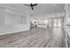 Expansive living room offering wood-look floors and an open floor plan at 5601 Mary Lou St, Pahrump, NV 89061