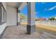 Inviting patio featuring tiled flooring and substantial support columns at 5601 Mary Lou St, Pahrump, NV 89061