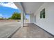 Covered patio with pavers and neutral paint and trim offers a versatile outdoor space at 5601 Mary Lou St, Pahrump, NV 89061