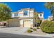 Charming two-story home with a three-car garage and well-maintained landscaping at 5824 Farmhouse Ct, Las Vegas, NV 89141