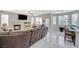 Open living space with a fireplace, plush seating, and access to the kitchen at 5824 Farmhouse Ct, Las Vegas, NV 89141