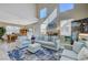 Spacious living room with plenty of natural light, comfortable seating, and elegant decor at 5824 Farmhouse Ct, Las Vegas, NV 89141