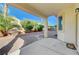 Inviting covered patio with desert landscaping and gravel, perfect for outdoor living and entertaining at 5824 Farmhouse Ct, Las Vegas, NV 89141