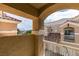 Balcony view reveals the architectural details of the townhomes with their stucco and tile roofs at 5855 Valley Dr # 2020, North Las Vegas, NV 89031