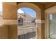 Balcony view shows the architecture of the surrounding townhomes with their stucco and tile roofs at 5855 Valley Dr # 2020, North Las Vegas, NV 89031