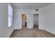 Empty bedroom featuring carpet flooring, with access to ensuite at 5855 Valley Dr # 2020, North Las Vegas, NV 89031