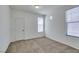 Empty bedroom featuring carpet flooring, and ample natural light at 5855 Valley Dr # 2020, North Las Vegas, NV 89031