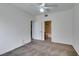 Empty bedroom featuring carpet flooring with access to ensuite at 5855 Valley Dr # 2020, North Las Vegas, NV 89031