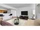 Inviting living room showcases a modern bar area, adjacent to a cozy seating area at 5855 Valley Dr # 2020, North Las Vegas, NV 89031