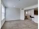 Open floorplan showing living room leading to kitchen and stairs at 5855 Valley Dr # 2020, North Las Vegas, NV 89031