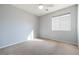 Light-filled bedroom with neutral carpet and paint, ideal for relaxation and personalization at 6120 Crystal Cascade St, Las Vegas, NV 89130