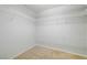A walk-in closet features wire shelving and carpet flooring at 6120 Crystal Cascade St, Las Vegas, NV 89130