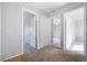Neutral hallway shows doorways into bedrooms, offering privacy and separation of living spaces at 6120 Crystal Cascade St, Las Vegas, NV 89130
