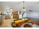 Open floor plan with kitchen, dining area, and living room, ideal for entertaining and Gathering living at 6120 Crystal Cascade St, Las Vegas, NV 89130