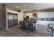 Stunning kitchen featuring stainless steel appliances, a spacious center island, and white cabinetry, perfect for cooking at 6197 Jewel Vista St, Las Vegas, NV 89135