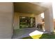Covered patio with built-in barbeque, perfect for entertaining outdoors next to green space at 6197 Jewel Vista St, Las Vegas, NV 89135