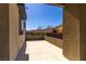 Wide open patio with view of trees and shrubs providing a serene and private outdoor space at 6197 Jewel Vista St, Las Vegas, NV 89135