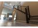 Staircase features modern railings and leads to the upper level at 6197 Jewel Vista St, Las Vegas, NV 89135
