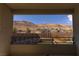 Breathtaking view of the desert and mountains from the balcony, showcasing the beauty of the surrounding landscape at 6197 Jewel Vista St, Las Vegas, NV 89135