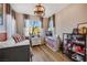 Cozy bedroom with ample natural light, complemented by modern decor and comfortable furnishings at 632 Loyalty Ct, Henderson, NV 89011