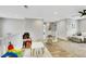 Bright bonus room features a play area with toys, couch and white railings at 632 Loyalty Ct, Henderson, NV 89011