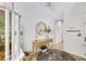 Bright entryway featuring a stylish console table, round mirror, and decorative accents at 632 Loyalty Ct, Henderson, NV 89011