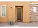 Inviting front entrance with a charming door, stylish accents, and a welcoming doormat at 632 Loyalty Ct, Henderson, NV 89011