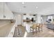 Bright kitchen featuring a large island with seating and stainless steel appliances at 632 Loyalty Ct, Henderson, NV 89011
