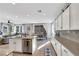 Open-concept kitchen with a dining area and view of the living room and outdoor patio at 632 Loyalty Ct, Henderson, NV 89011