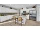 Beautiful kitchen featuring a large island with seating, stainless steel appliances at 632 Loyalty Ct, Henderson, NV 89011