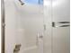 Bathroom featuring glass shower with seat at 6479 Gunderson Blvd, Las Vegas, NV 89103