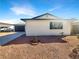 Well-maintained home featuring desert landscaping and a two-car garage, offering comfort and convenience at 6479 Gunderson Blvd, Las Vegas, NV 89103