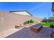 Enjoy the beautiful backyard with landscaped planters and a relaxing hot tub at 6602 Windy Palm St, North Las Vegas, NV 89086
