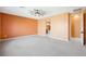 Spacious bedroom with neutral carpet and a ceiling fan, offering a relaxing retreat at 6602 Windy Palm St, North Las Vegas, NV 89086