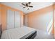 Bedroom with closet, carpet, and ceiling fan at 6602 Windy Palm St, North Las Vegas, NV 89086