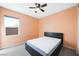 Bedroom with carpet, ceiling fan, and natural light at 6602 Windy Palm St, North Las Vegas, NV 89086
