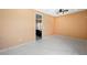 This bedroom features light tile floors and modern lighting at 6602 Windy Palm St, North Las Vegas, NV 89086