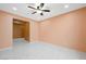 Bedroom with tile floors and ceiling fan at 6602 Windy Palm St, North Las Vegas, NV 89086
